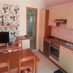 A2+2: Kitchen and Dining Area