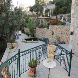 View to the garden with pond and gazebo