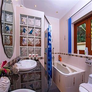 On-Suite Master Bathroom showing Bath & Shower